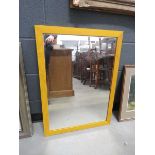 Rectangular mirror in yellow painted frame