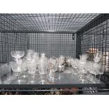 Cage containing stainless steel teapots and sugar bowls plus a scent bottle, wine and sherry