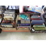 Three boxes containing a quantity of reference and cookery books