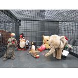 Cage containing wind up toys