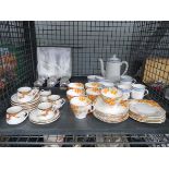 Cage containing Shelly floral patterned cups, saucers and side plates plus an Atlas china coffee