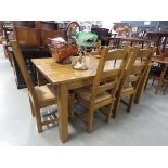 Oak dining table plus 6 chairs with strung seats