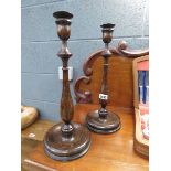 Pair of turned oak candlesticks