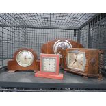 Cage containing 4x mantle clocks