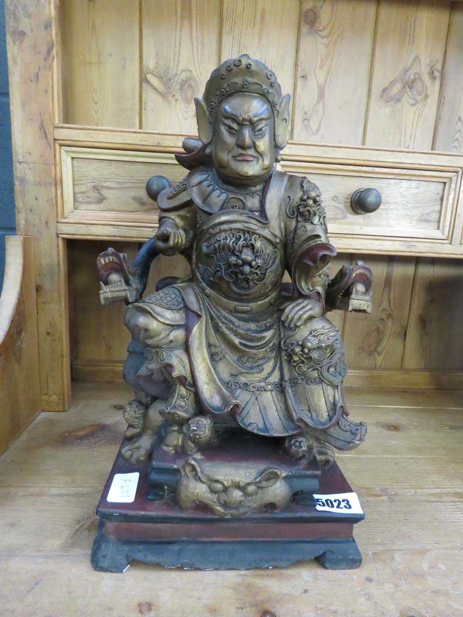 Carved wooden Chinese figure of a seated nobleman
