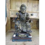 Carved wooden Chinese figure of a seated nobleman