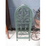 Green painted metal wine rack