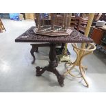 Heavily carved Indian table