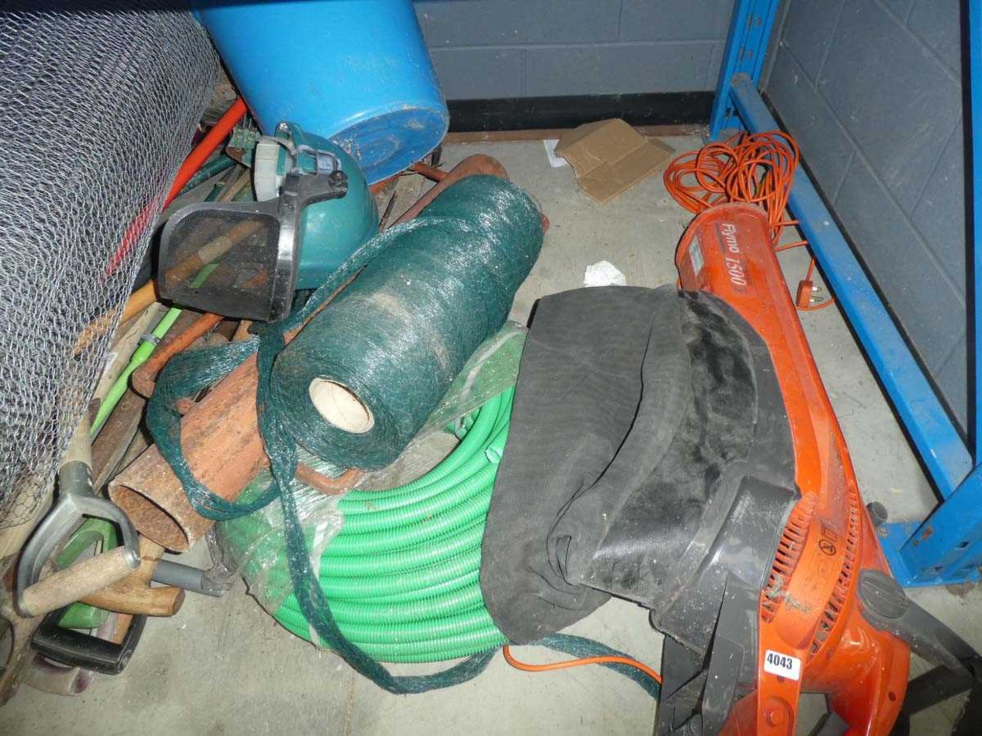 3 quarters of an underbay containing chicken wire, hose, leaf blower, garden tools, jacks, pickaxes, - Image 3 of 6