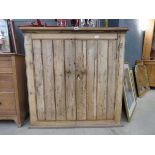 Stripped pine double door cupboard