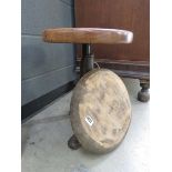 Circular wooden seat plus metal Singer sewing machine stool