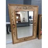 Rectangular mirror in floral patterned frame