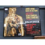 Framed and glazed Goldfinger advertising poster