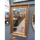 Rectangular mirror in decorative gilt frame