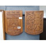 Pair of carved oak German coats of arms
