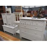 Qty of white painted bedroom furniture to include chest of drawers, pair of bedside cabinets,