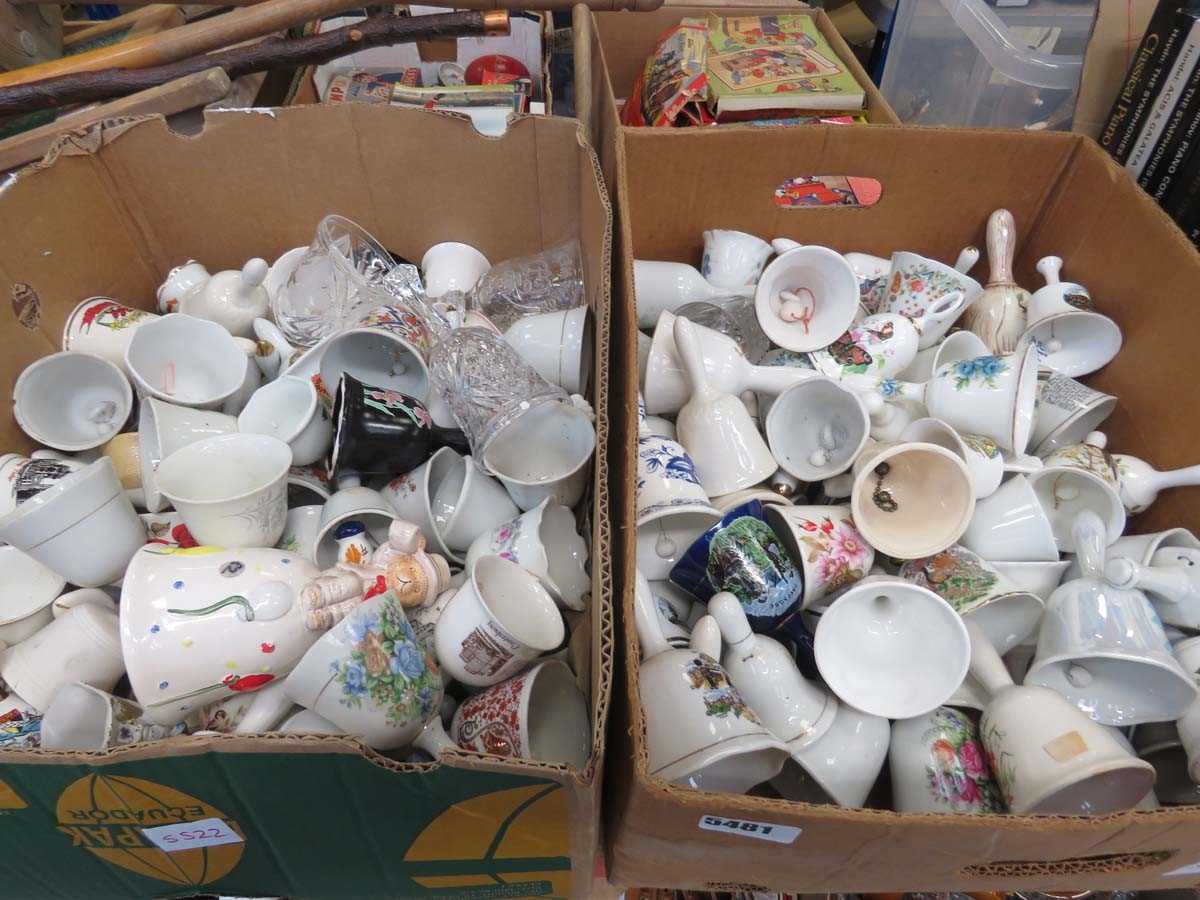 2 boxes containing glassware and porcelain bells