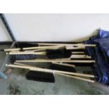 10 wooden handled stiff brooms