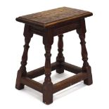 An oak joint stool, w, 47 cm, h. 53 cm