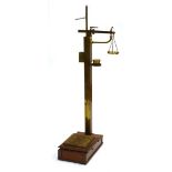 A set of Victorian mahogany and brass mounted platform scales by Avery together with the