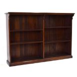 A Victorian mahogany open-fronted bookcase with adjustable shelves on a plinth base, l. 147 cm
