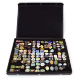 A case containing approximately one hundred and sixteen 1940's-1960's enamelled Butlin's badges, Ayr