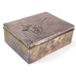 An early 20th century Japanese Export silver cigarette box of hammered rectangular form, relief