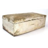 An early 20th century silver cigarette/cigar box of plain rectangular form, maker J&C, Birmingham