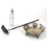 A group of silver comprising a pierced octagonal dish, a toddy ladle and a bottle, various dates and