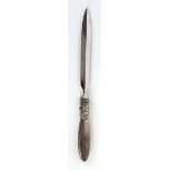 A Georg Jensen silver letter opener, the handle decorated with stylised flowers, l. 19.5 cmCondition