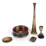 A late 20th century silver wine coaster, a miniature silver trophy and a silver vesta case,