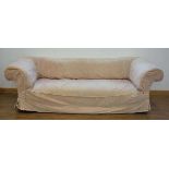 For Reupholstery: a late Victorian chesterfield-type sofa by Howard & Sons, the rear mahogany leg