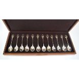 A set of twelve silver and parcel gilt RSPB collectors spoons, John Pinches, London 1975, cased