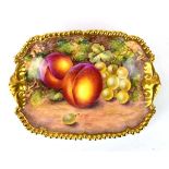 A Royal Worcester shallow dish of rectangular form, w. 17.5 cm, decorated with ripe fruits and