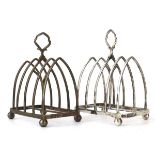 A pair of early 20th century silver four slice toast racks of arched shaped form, maker SWS&Co.,