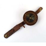 A Second World War US paratroopers wrist compass with a brown bakelite caseCondition report: