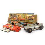 A West German tinplate model of a racing car, l. 31.5 cm, together with two further tinplate cars