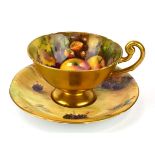 A Royal Worcester cabinet cup and saucer, saucer d. 14.5 cm, each decorated with ripe fruits, cup