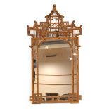 A late 20th century bamboo-type fretwork wall mirror, h. 134 cm