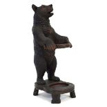An early 20th century 'Black Forest' carved stick and umbrella stand modelled as a bear with