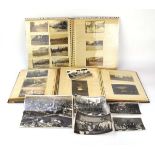 Three albums containing approximately one-hundred and twenty postcards and photographs relating to