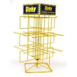 A Dinky Toys yellow painted metal revolving shop display stand, h. 63 cm