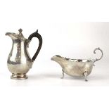 A French metalware lidded jug of bolbous form, h. 13.5 cm, together with an Asprey silver sauce