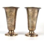 A pair of early 20th century silver vases/beakers of flared form, Goldsmiths & Silversmiths Co.,