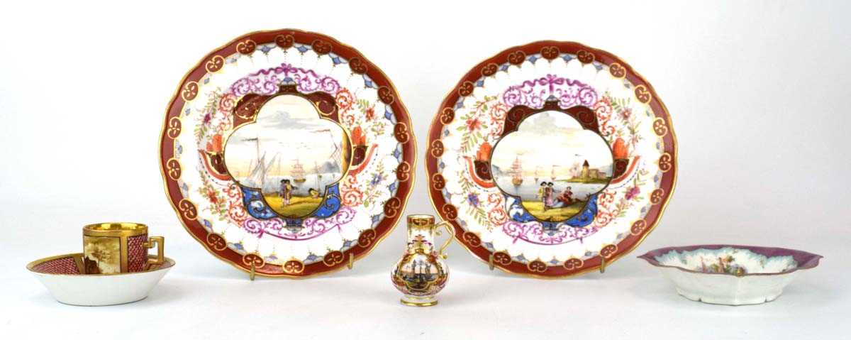 A pair of Dresden cabinet plates, each depicting a harbour scene within a rust border, d. 21 cm,