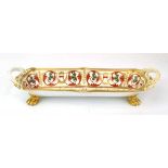 A Royal Crown Derby two handled desk stand of slim rectangular form, gilt decorated in the Neo-