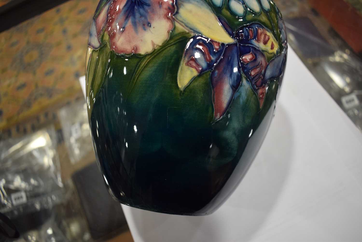 A Moorcroft water jug of ovoid form decorated with stylised flowers on a shaded green ground, h. - Image 7 of 7