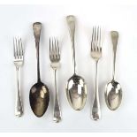 A George III silver old English pattern table spoon, maker SD, London 1809, together with three