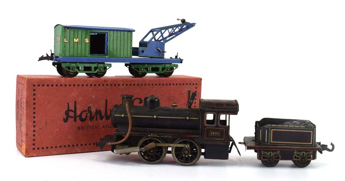 A Hornby O gauge tinplate breakdown van and crane, boxed, together with a German steam driven loco