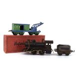 A Hornby O gauge tinplate breakdown van and crane, boxed, together with a German steam driven loco